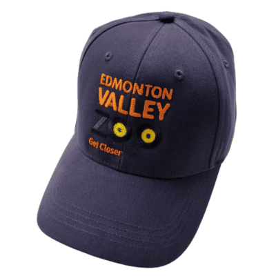 Image of a navy ball cap with the Edmonton Valley Zoo Meerkat logo on the front
